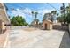 Large backyard with ample space, shed, and fenced pool area with palm trees at 2809 Mason Ave, Las Vegas, NV 89102
