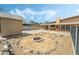 Backyard features a large fire pit and a storage shed behind the home at 2809 Mason Ave, Las Vegas, NV 89102