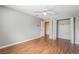 Bedroom with laminate floors, ceiling fan, and a closet with sliding doors at 2809 Mason Ave, Las Vegas, NV 89102