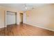 Bright bedroom with wood floors, ceiling fan, and neutral color palette at 2809 Mason Ave, Las Vegas, NV 89102