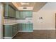 Bright kitchen featuring tile countertops and tiled backsplash at 2809 Mason Ave, Las Vegas, NV 89102