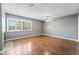 Inviting living room features wood floors, a cozy fireplace and plantation shutters at 2809 Mason Ave, Las Vegas, NV 89102