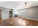 Bright living room with wood floors, fireplace, and natural light at 2809 Mason Ave, Las Vegas, NV 89102