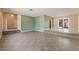 Expansive living room with tile floors, multi-level layout, and natural light from sliding glass doors at 2809 Mason Ave, Las Vegas, NV 89102