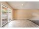 Bright living room with tile floors and sliding glass doors leading to the outside at 2809 Mason Ave, Las Vegas, NV 89102
