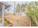 Expansive backyard featuring a storage shed and mature trees, perfect for outdoor activities at 2819 Taylor Ave, North Las Vegas, NV 89030