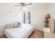 Bedroom with wood floors, window, and closet with the shoe rack organizer at 2819 Taylor Ave, North Las Vegas, NV 89030