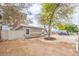 Charming exterior showcasing stone accents, decorative paving, and mature shade tree at 2819 Taylor Ave, North Las Vegas, NV 89030