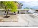 Charming single-story home features stone accents, mature landscaping, and a covered parking area at 2819 Taylor Ave, North Las Vegas, NV 89030