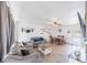 Bright and airy living room boasting a ceiling fan, stylish furniture, and an open layout with lots of natural light at 2819 Taylor Ave, North Las Vegas, NV 89030