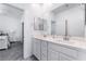 Bathroom with a double vanity and framed mirrors above the sink at 2964 Gunnery Forge St, Las Vegas, NV 89156