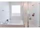 Modern bathroom with separate tub and shower, featuring a bright and clean aesthetic at 2964 Gunnery Forge St, Las Vegas, NV 89156