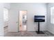 Bedroom with a mounted TV and tile flooring in the en-suite bathroom at 2964 Gunnery Forge St, Las Vegas, NV 89156