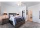 Bedroom featuring neutral colored decor and carpet at 2964 Gunnery Forge St, Las Vegas, NV 89156