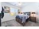 Bedroom featuring a ceiling fan, artwork, and a large window at 2964 Gunnery Forge St, Las Vegas, NV 89156