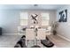 Dining room featuring modern glass table, six chairs, contemporary art, and an area rug at 2964 Gunnery Forge St, Las Vegas, NV 89156