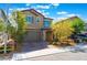 Charming two-story home featuring a two-car garage, desert landscaping, and a welcoming facade at 2964 Gunnery Forge St, Las Vegas, NV 89156