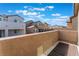 View from balcony of multiple houses with blue skies and clouds at 2964 Gunnery Forge St, Las Vegas, NV 89156