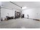 Spacious garage with epoxy floors, and a garage door to the exterior at 2964 Gunnery Forge St, Las Vegas, NV 89156