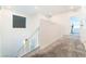 Upstairs hallway featuring grey carpet leading to other rooms at 2964 Gunnery Forge St, Las Vegas, NV 89156