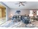 Comfortable living room with a stylish seating arrangement and a sliding glass door to the patio at 2964 Gunnery Forge St, Las Vegas, NV 89156