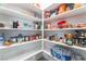 Organized pantry with ample shelving for storage of food items and household supplies at 2964 Gunnery Forge St, Las Vegas, NV 89156