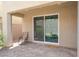 Covered patio with brick pavers, a sliding glass door, and a view of the outdoor furniture at 2964 Gunnery Forge St, Las Vegas, NV 89156