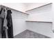 Large walk-in closet with carpet and wood and white shelving at 2964 Gunnery Forge St, Las Vegas, NV 89156
