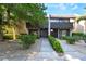 Charming townhouse exterior featuring well-maintained landscaping and a welcoming entrance at 3260 Longford Way, Las Vegas, NV 89121