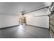Spacious garage interior with painted floors and walls, ready for customization at 3260 Longford Way, Las Vegas, NV 89121