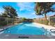 Large community pool with clear blue water, perfect for swimming laps and recreation at 3260 Longford Way, Las Vegas, NV 89121