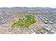 Extensive aerial view showcasing community parks, green spaces, trails, and recreation areas at 329 Brockbank Pl, Henderson, NV 89011