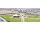 Aerial view showcasing community parks, playgrounds, sports courts, and green spaces at 329 Brockbank Pl, Henderson, NV 89011