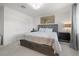 Calm bedroom with a cozy bed, dresser, and window with natural light at 329 Brockbank Pl, Henderson, NV 89011