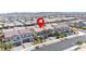 Inviting two-story home with a well-manicured front yard and attached two-car garage in a suburban neighborhood street view at 329 Brockbank Pl, Henderson, NV 89011