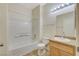 Bathroom featuring a shower-tub combination, single sink vanity with tile countertop, and tiled floor at 3318 N Decatur Blvd # 1061, Las Vegas, NV 89130