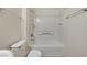 Bright white bathroom featuring a shower and bathtub combination at 3318 N Decatur Blvd # 1061, Las Vegas, NV 89130