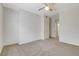 Spacious bedroom features neutral walls, carpet, and a ceiling fan at 3318 N Decatur Blvd # 1061, Las Vegas, NV 89130