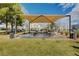 Outdoor shaded picnic area with tables and grills, perfect for gatherings at 3318 N Decatur Blvd # 1061, Las Vegas, NV 89130