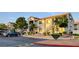 Inviting apartment complex with well-maintained landscaping, ample parking, and convenient stair access at 3318 N Decatur Blvd # 1061, Las Vegas, NV 89130