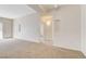 Bright living room with open access to a hallway, enhancing natural light and space at 3318 N Decatur Blvd # 1061, Las Vegas, NV 89130