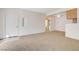 Inviting living room with open access to kitchen and hallway, enhancing flow and functionality at 3318 N Decatur Blvd # 1061, Las Vegas, NV 89130
