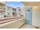Apartment complex patio with view of building exterior, stairways, and storage closet at 3318 N Decatur Blvd # 1061, Las Vegas, NV 89130