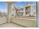 Covered patio area with view of the apartment complex exterior and staircases at 3318 N Decatur Blvd # 1061, Las Vegas, NV 89130