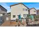 Fenced backyard featuring lounge furniture, desert landscaping, and a natural gas grill at 3389 Commendation Dr, Las Vegas, NV 89117