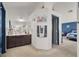 En-suite bathroom with double sink vanity, walk in closet, and access to bedroom at 3389 Commendation Dr, Las Vegas, NV 89117