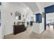 Inviting foyer with modern decor, seamlessly connecting the living spaces and creating a warm entry at 3389 Commendation Dr, Las Vegas, NV 89117