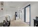 An open hallway featuring carpet flooring with several doors leading to separate rooms at 3389 Commendation Dr, Las Vegas, NV 89117