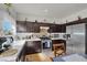 Well-equipped kitchen with stainless steel appliances, ample counter space, and a cozy breakfast nook at 3389 Commendation Dr, Las Vegas, NV 89117