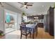Bright kitchen featuring modern appliances, a casual dining area, and seamless access to the outdoor patio at 3389 Commendation Dr, Las Vegas, NV 89117